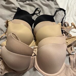 Set of Three Padded Bras in Black and Nude Tones